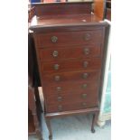 Edwardian mahogany inlaid filing cabinet on cabriole legs.