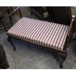 20th Century mahogany two seater piano stool with hinged lid on cabriole legs.