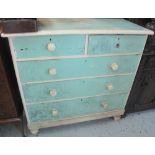 Victorian painted straight front chest of two short and three long drawers on baluster turned legs.