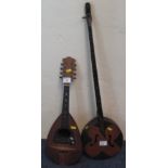Italian eight string mandolin with mother-of-pearl inlaid, tortoiseshell finger board,