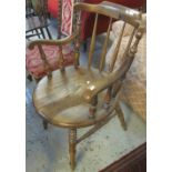 20th Century elm spindle back kitchen chair with circular seat.