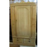 Late 19th/early 20th Century pine single door wardrobe.