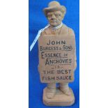 Early 20th Century terracotta pottery advertising figure,