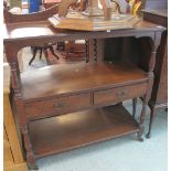 Edwardian oak three tier dumb waiter on casters.