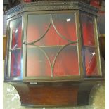 Edwardian mahogany hanging glazed display cabinet with dentil cornice and foliate fretwork