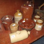 Collection of assorted stoneware flagons, jars, cream pan and hot water bottle, various.