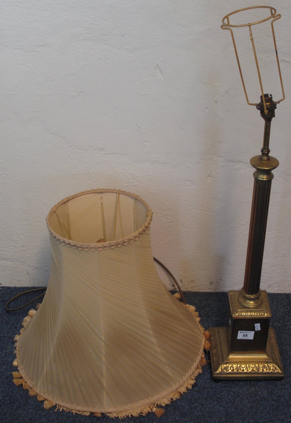 Brass column table lamp and shade.