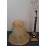 Brass column table lamp and shade.
