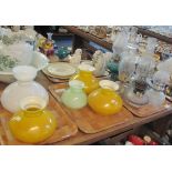 Two trays of opaline glass coloured oil burner shades together with a tray of various single and