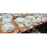 Four trays of Colclough bone china 'Ivy' design tea and dinnerware items comprising: teacups and