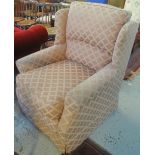 Modern upholstered armchair.