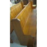Large early 20th Century pitch pine pew.