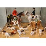 Beswick china hunting group comprising male and female on horseback together with two children on