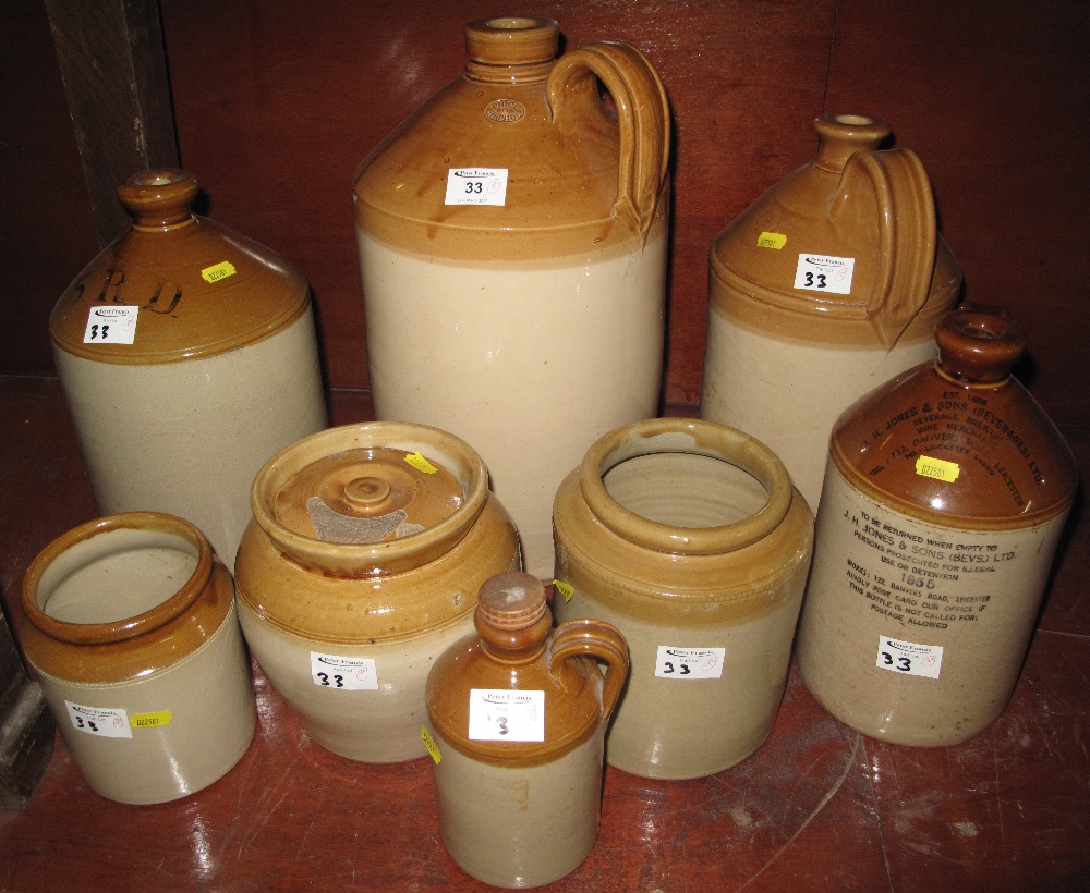 Group of assorted stoneware jars and flagons, various.