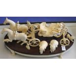 Early 20th Century carved ivory horse and carriage with carved figure of gentleman on plinth,