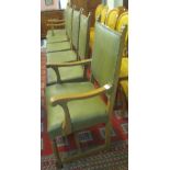 Set of six oak and leather dining chairs (4+2) with metal stud work decoration,