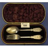 Cased two piece engraved silver Christening set comprising: knife and fork, with initials,