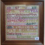 Wooden tapestry sampler by Aida Robinson, aged 9, 1881. Framed and glazed.