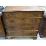 18th Century pine and walnut veneered straight front chest of four long drawers on bracket feet.