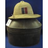 Conical metal hat box, together with an 'Aura' British military pith type helmet/topee. (B.P.