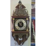 Modern Flemish design wall clock with figural pediment. (B.P. 24% incl.