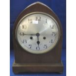 Early 20th Century oak cased, two train, lancet shaped mantel clock. (B.P. 24% incl.