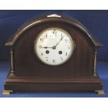 Early 20th Century two train mahogany arched mantel clock with enamel face,