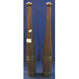 Pair of early 20th Century turned pitch pine juggling or exercise batons. (B.P. 24% incl.