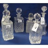 Pair of early 20th Century ribbed, moulded glass, mallet shaped decanters with associated stoppers,