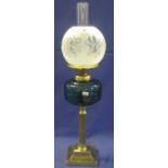 Early 20th Century brass single burner oil lamp with glass reservoir on brass pedestal stepped base,