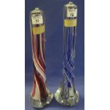 Two similar Strathearn Art Glass lamp bases, red and blue spiral caned decoration.