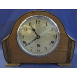 Mid Century oak cased, three train, arched mantel clock. (B.P. 24% incl.