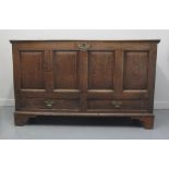 LATE 19TH/EARLY 19TH CENTURY OAK COFFER, having hinged plank top revealing candle box above four