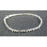 18CT WHITE GOLD AND DIAMOND TENNIS BRACELET,