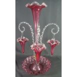 VICTORIAN CRANBERRY GLASS TABLE CENTRE EPERGNE having centre flute with three spiral canes