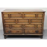 18TH CENTURY OAK COFFER, having an arrangement of eleven fielded and moulded panels to the front,