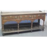 18TH CENTURY WELSH OAK DRESSER BASE with later associated open two shelf rack,