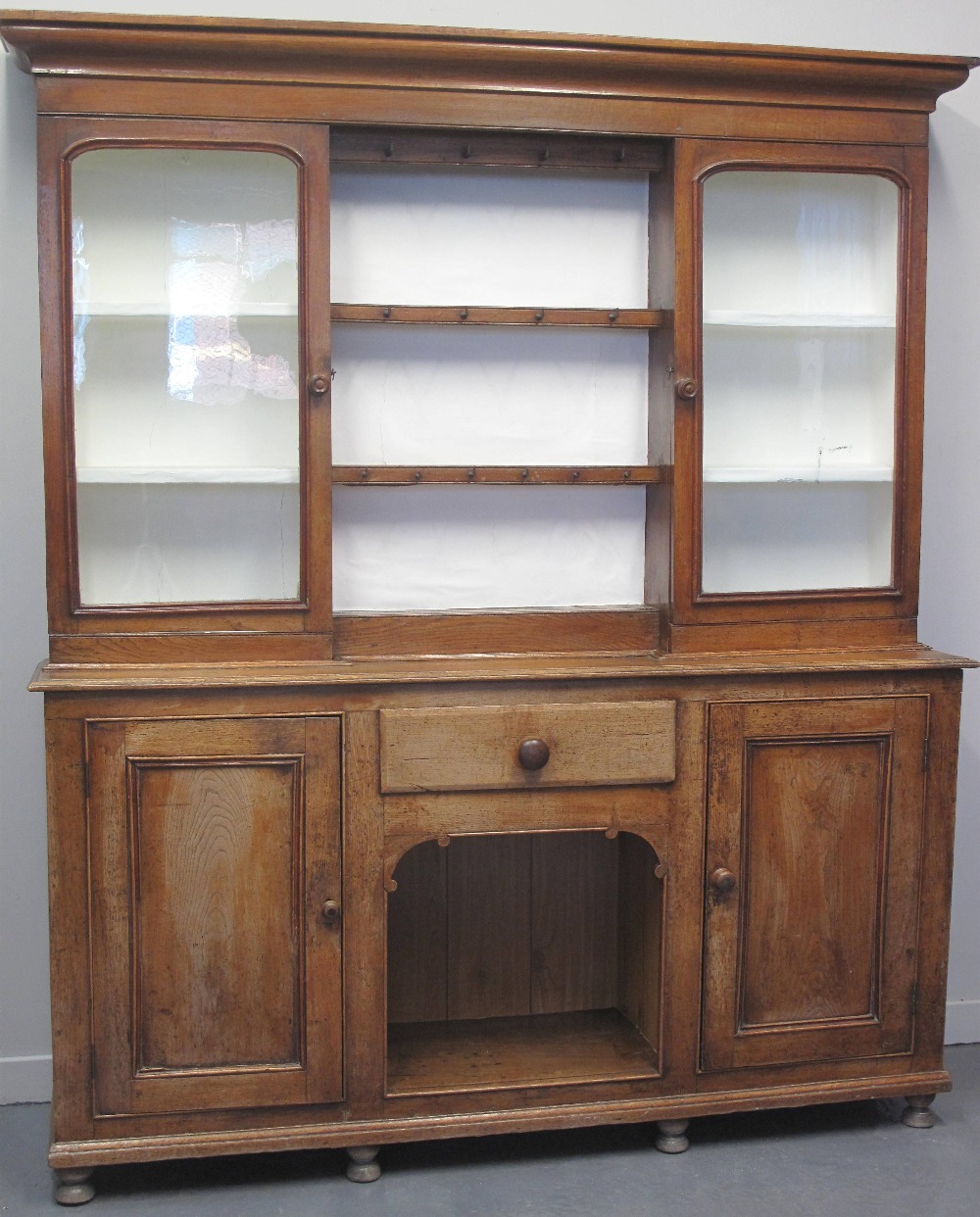 19TH CENTURY WELSH OAK, CABINET BACKED, DOG KENNEL DRESSER, having moulded cornice over pair of