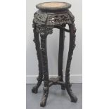 CHINESE PADAUK WOOD TALL JARDINIERE STAND with inset veined marble top, overall carved with prunus