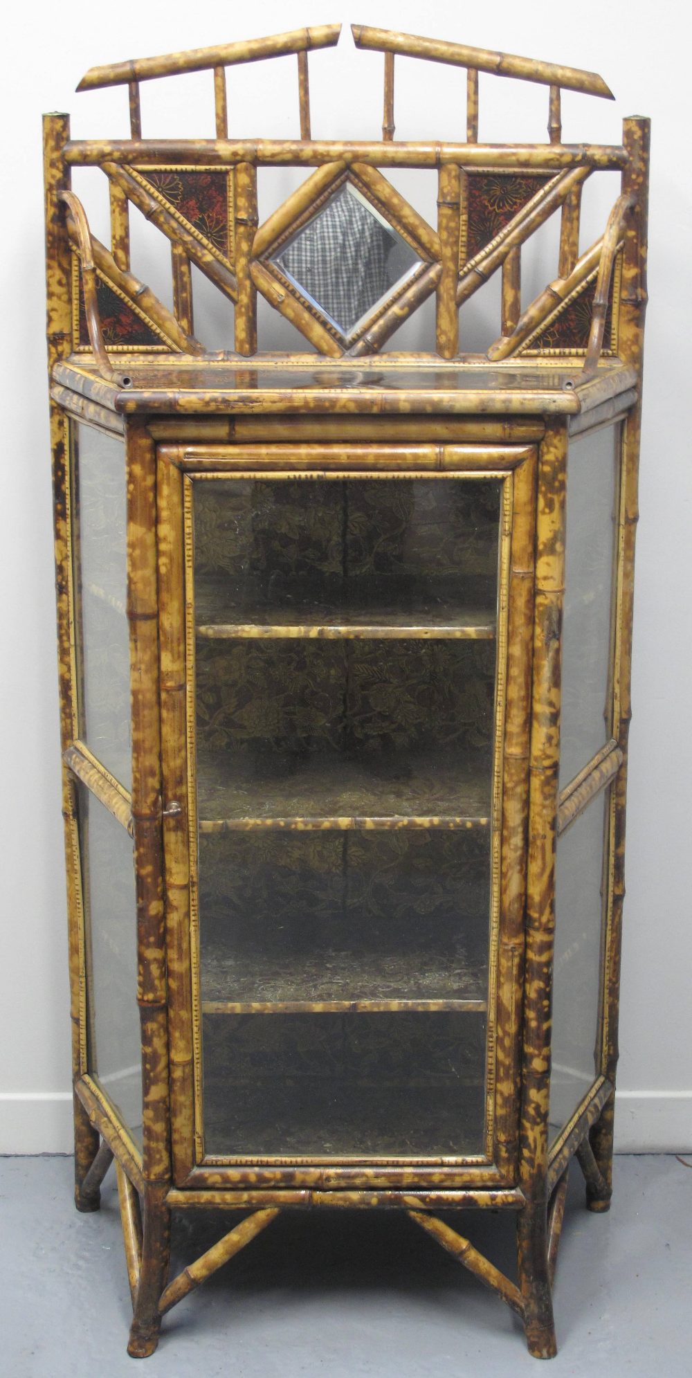 EARLY 20TH CENTURY BAMBOO DISPLAY CABINET, having single door and flanked by glazed panels. The