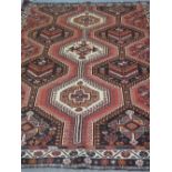 PERSIAN SHIRAZ VILLAGE RUG overall with repeating Tree of Life and geometric lozenge design on a