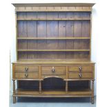 EARLY 19TH CENTURY CARDIGANSHIRE WELSH OAK, RACK BACKED, POT BOARD DRESSER, the boarded back with