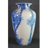 LATE 19TH CENTURY JAPANESE PORCELAIN SHOULDERED BALUSTER VASE, painted overall with underglazed
