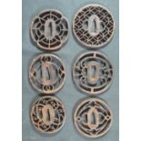 GROUP OF SIX JAPANESE IRON TSUBA SWORD GUARDS, all of circular openwork, pierced designs. (6) (B.P.