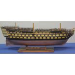 WELL MADE AND DETAILED MODEL OF THE HULL ONLY OF 'HMS VICTORY', on display stand. 90cm long. (B.P.