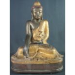 CAST BRONZE GILDED STUDY OF THE SEATED BUDDHA in meditative,