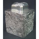 CHINESE SILVER SQUARE SHAPED TEA CADDY with hinged cover and inner removable cover, overall repousse