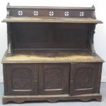 EARLY 20TH CENTURY STAINED OAK, GOTHIC DESIGN SIDEBOARD, having raised back with pierced cruciform