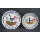 TWO SIMILAR 19TH CENTURY LLANELLY POTTERY COCKEREL PLATES, having painted,