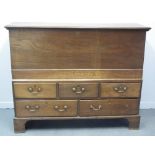 EARLY 19TH CENTURY WELSH OAK ONE PIECE MULE CHEST, having hinged, moulded top over plain front,